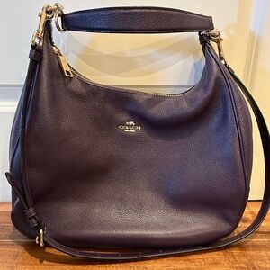 Purple Coach purse.